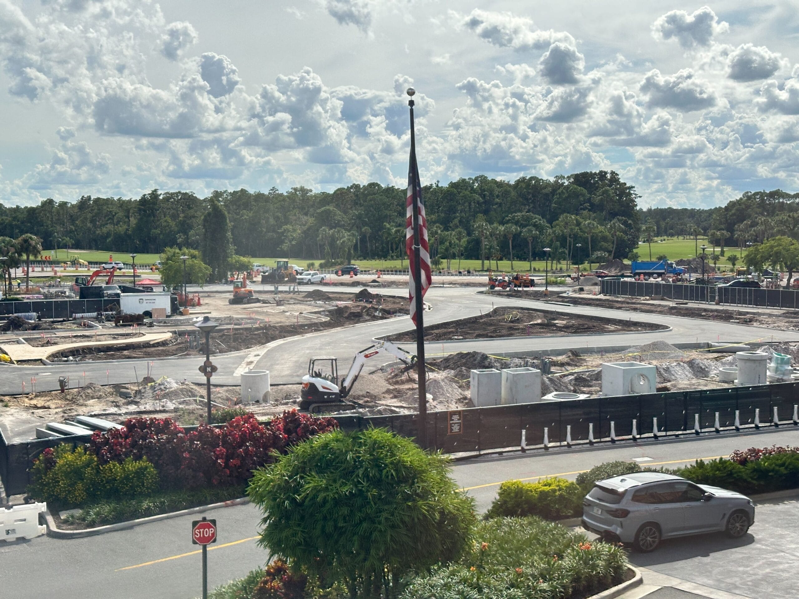 A construction site at Disney's Polynesian Village Resort with vehicles, dirt piles, and a cloudy sky in the background. A construction site at Disney's Polynesian Village Resort with vehicles, dirt piles, and a cloudy sky in the background.